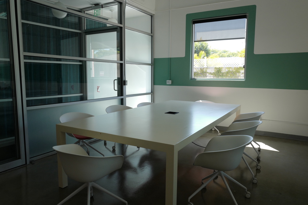 Minimal meeting room with daylight and clean furniture lines